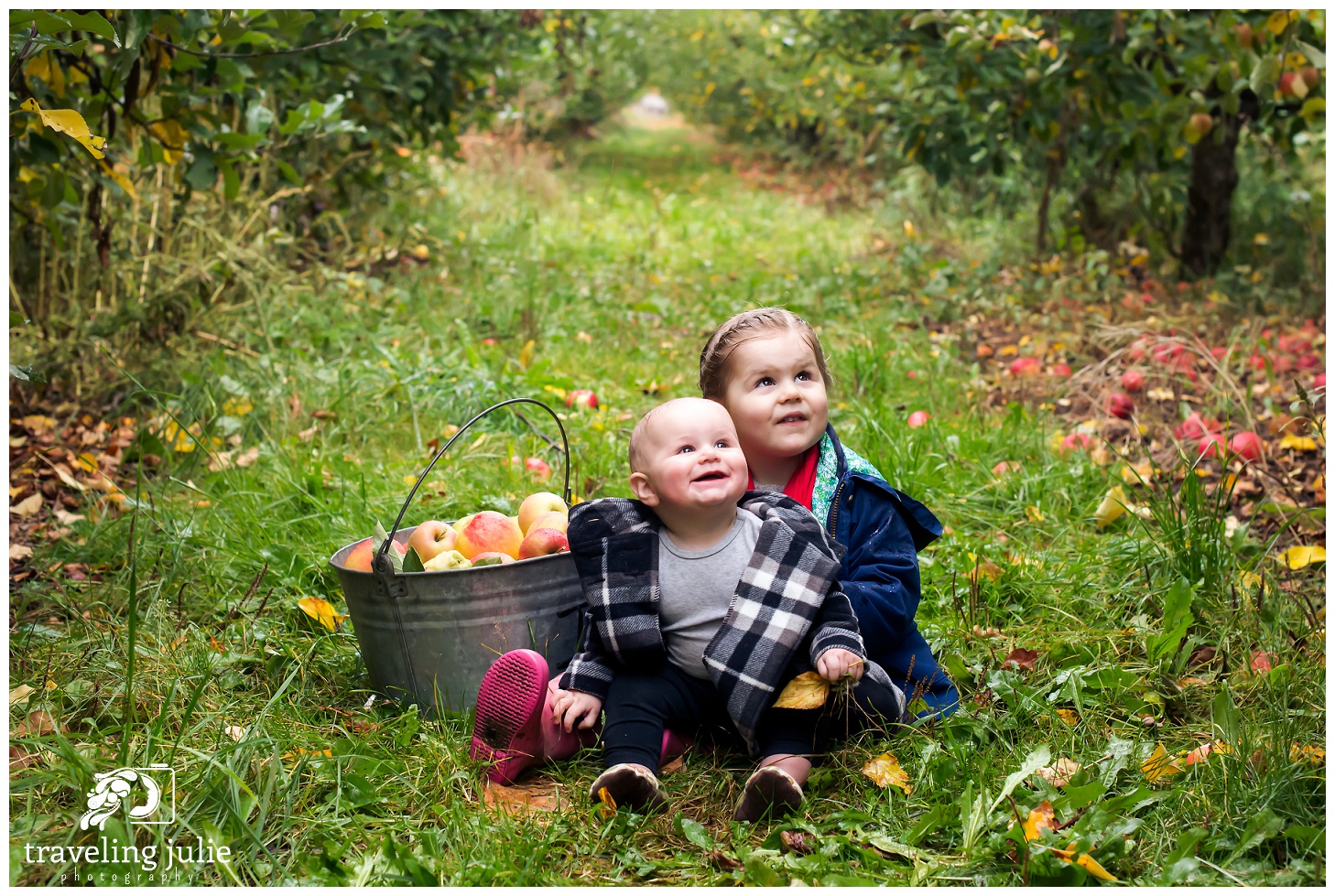 Portrait of sisters in an apple orchard