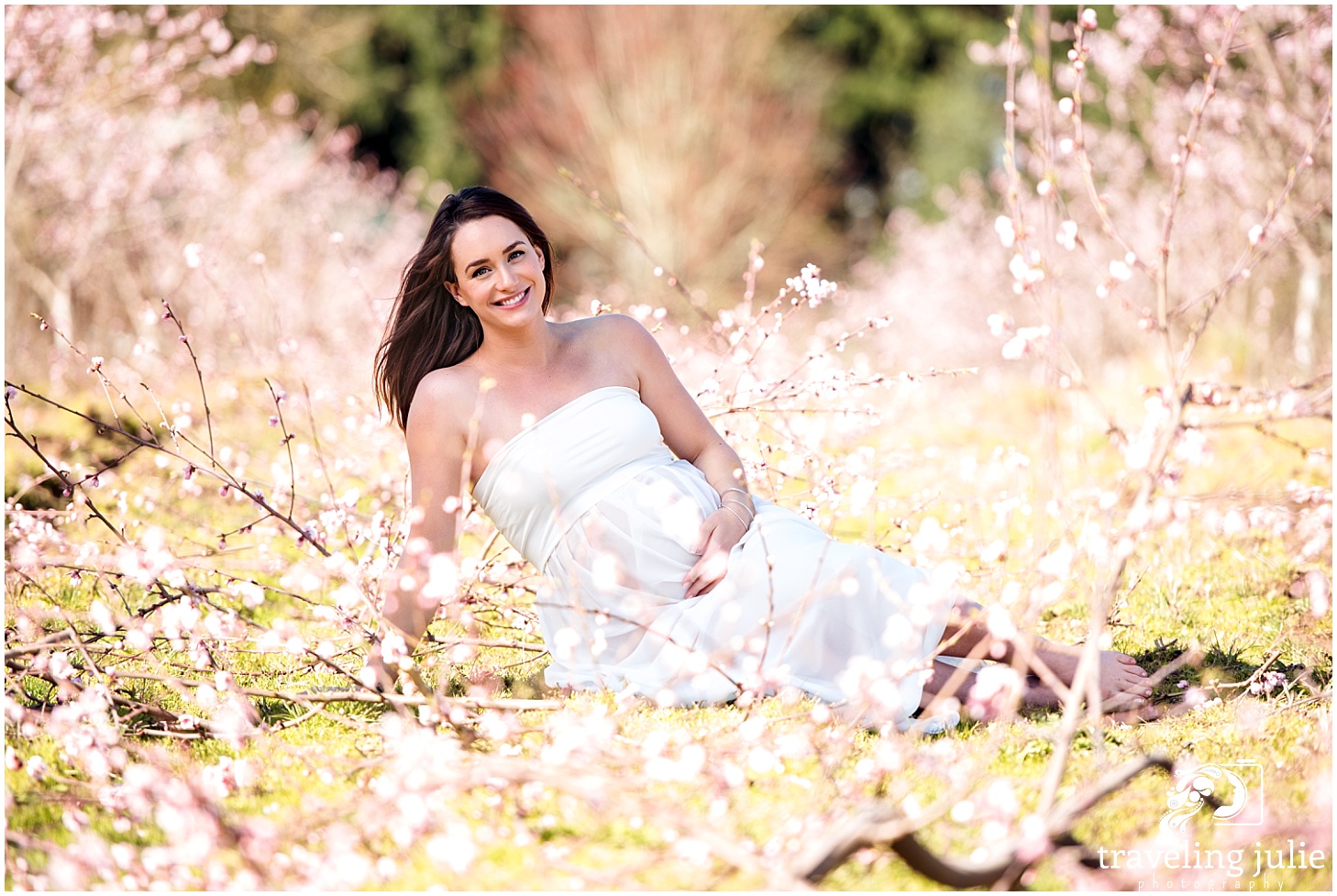 maternity portrait among peach blossoms